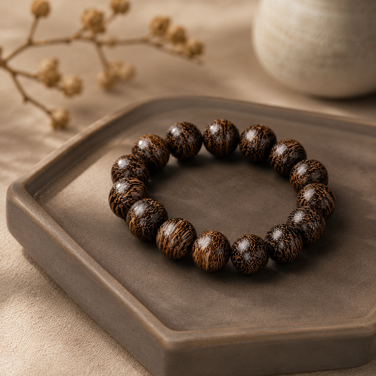 TAM display of natural stone jewelry and candles illustrating a luxury spiritual lifestyle