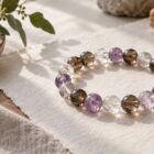 Crystal bead bracelet with clear quartz, smoky quartz, and pale amethyst beads